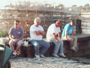 Men at boat ramp, evening time